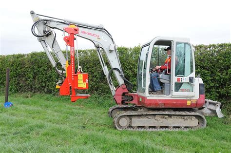 vector mini excavator post driver|mini excavator post hole digger.